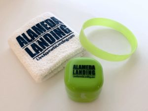 Sweat band, Wrist band, and Lipgloss Designed as a Leave Behind at a Grand Opening
